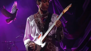 Midjourney image of Prince playing a Telecaster with a dove flying in the background